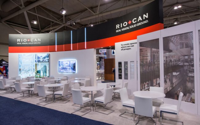 Riocan trade show booth with many meeting tables