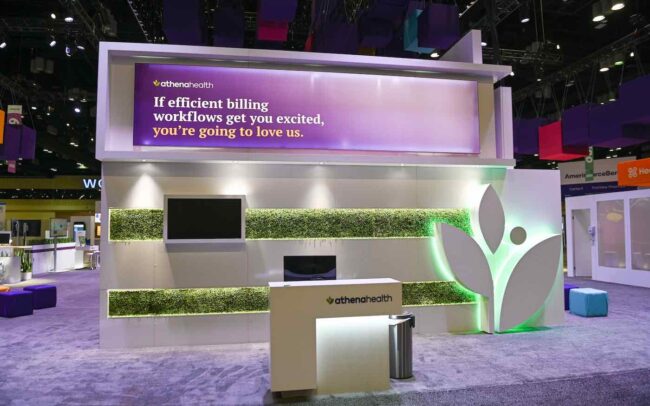 View of Athenahealth reception in trade show booth at HIMSS